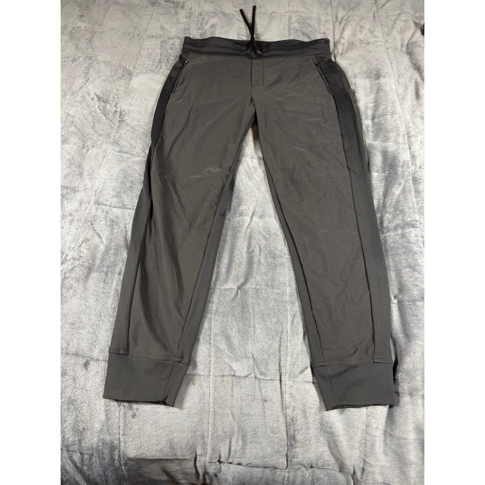 Athleta Women black Technical Tapered Jogger Pants Size 14 Zipper Pockets Travel